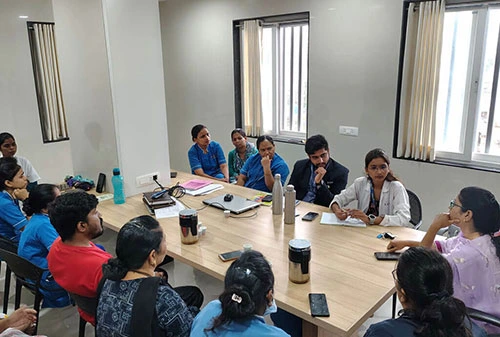 Doctors team meeting and discussing patient treatment in hospital Nashik